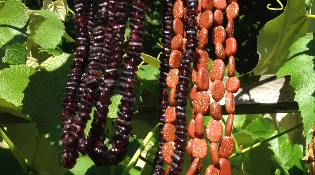 Garnet and sandstone necklaces